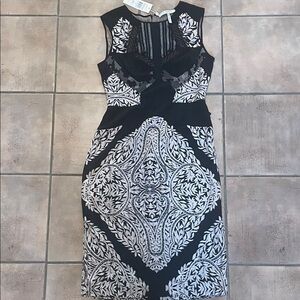 BCBGMaxAzria Black and Cream Patterned Midi Dress The “Silvia” Dress.